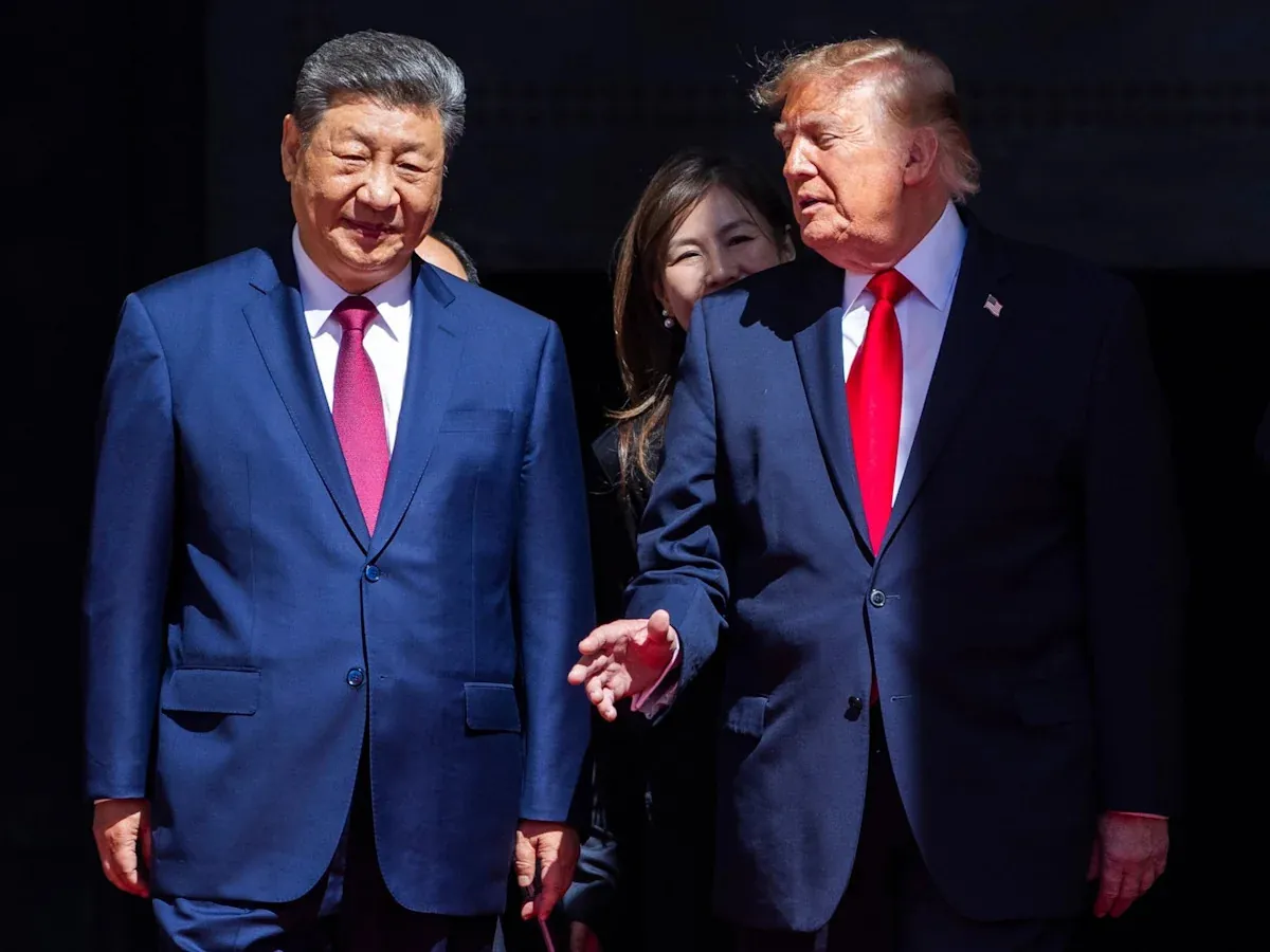 Xi Jinping and Donald Trump in suits with red ties